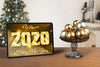 Tablet Beside Tray With Globes For New Year Psd
