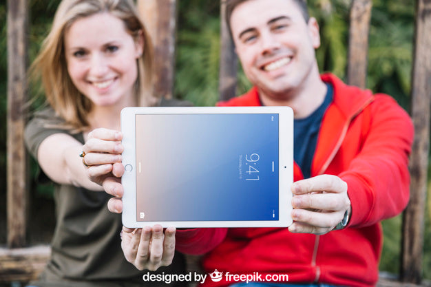 Tablet Mockup With Couple Outdoors Psd