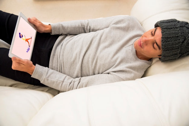 Tablet Mockup With Man Chilling On Couch Psd