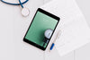 Tablet Mockup With Medical Elements Psd