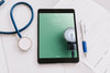 Tablet Mockup With Medical Elements Psd