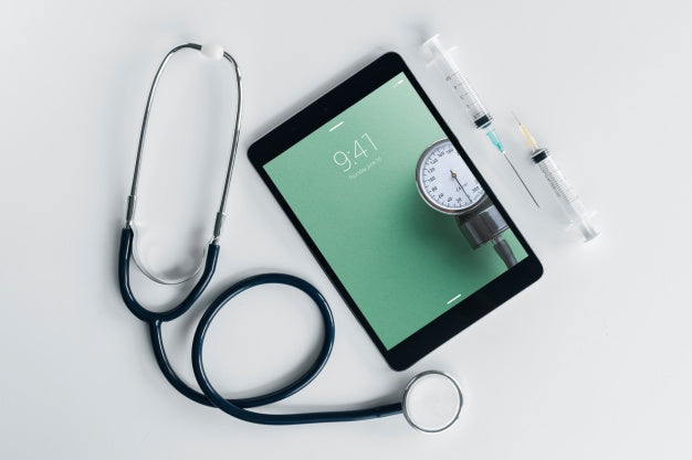 Tablet Mockup With Medical Elements Psd