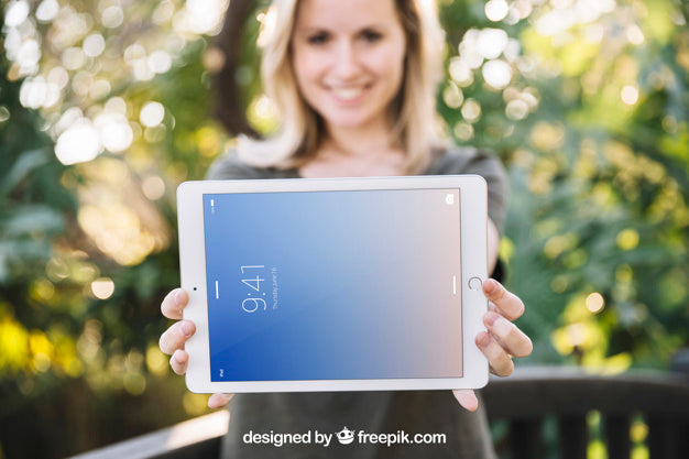 Tablet Mockup With Woman In Nature Psd