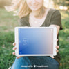 Tablet Mockup With Woman Outdoors Psd