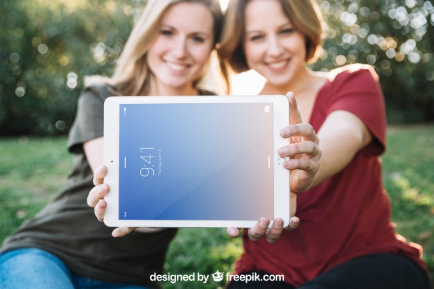 Tablet Mockup With Women In Nature Psd