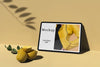 Tablet With Leaves Shadow And Citrus Psd