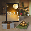 Tablet With New Year Wish Message On Table Psd