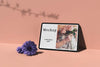 Tablet With Photo And Flowers Psd