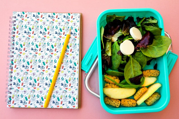 Take Away Food Concept With Salad And Notebook Psd