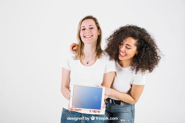 Technology Mockup With Happy Women Showing Tablet Psd