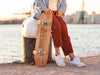 Teenager With Mock-Up Skateboard At The Pier Psd