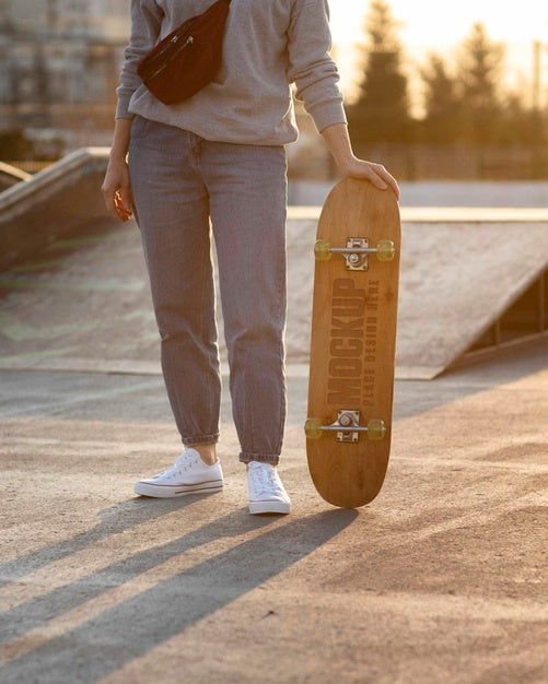 Teenager With Mock-Up Skateboard Outdoors Psd