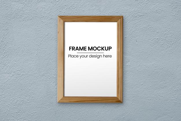 Thin Wooden Frame Over Blue Wall Mockup Psd