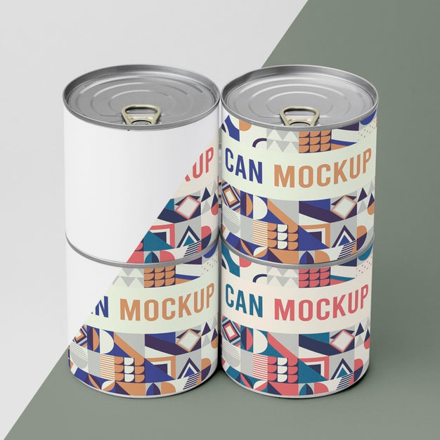 Tin Cans Arranged On Table Psd