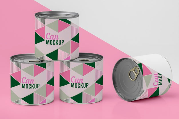 Tin Cans Arranged On Table Psd