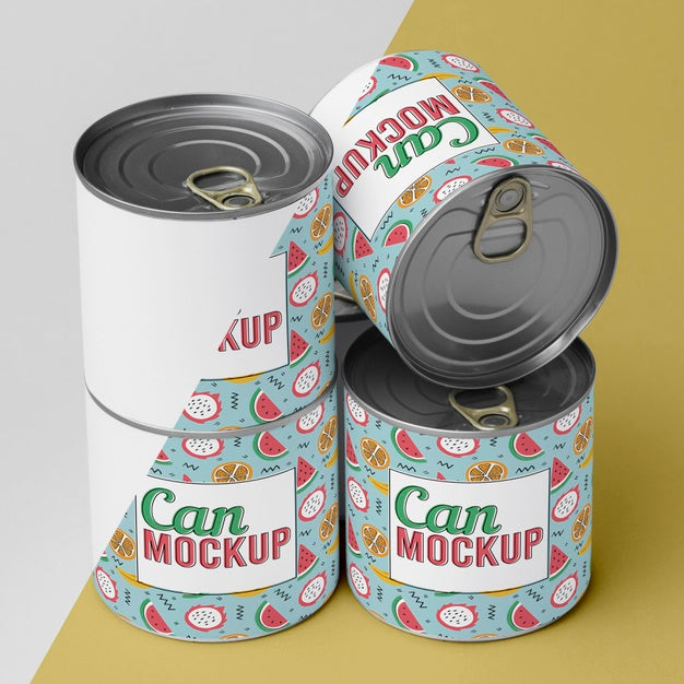 Tin Cans Arranged On Table Psd