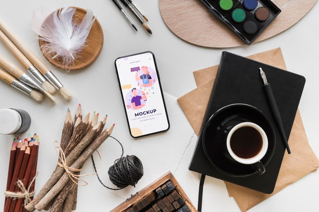 Top View Acrylic Palette And Brushes Beside Cup Of Coffee Psd