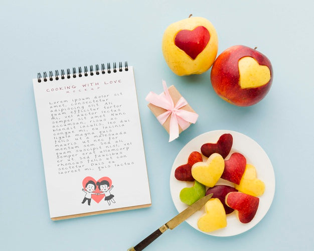 Top View Apples And Notebook Arrangement Psd