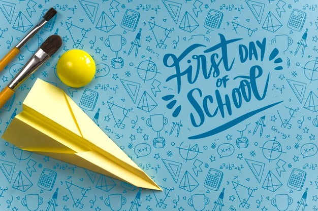 Top View Arrangement With Paper Airplane And Brushes Psd