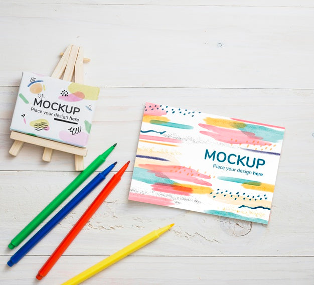 Top View Artist Concept Arrangement With Card And Canvas Mock-Up Psd