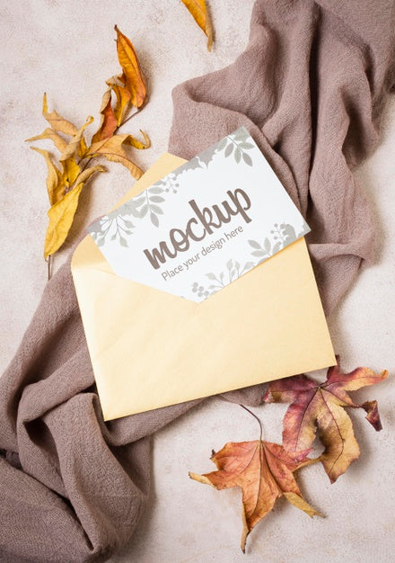 Top View Autumn Mock-Up With Leaves On Grey Cloth Psd
