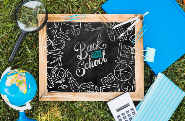 Top View Back To School Arrangement On Grass Psd