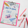 Top View Back To School Sale With Clipboard And Supplies Psd