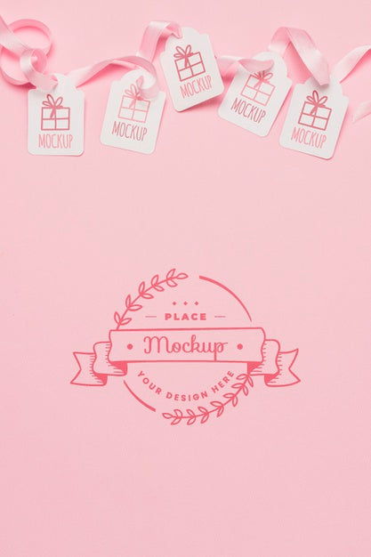 Top View Birthday Gift Tags Mock-Ups With Pink Ribbons Psd