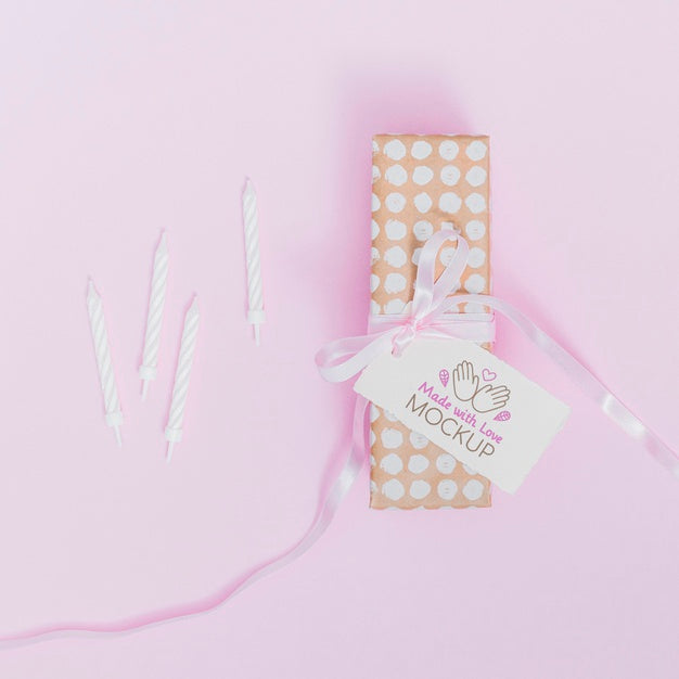 Top View Birthday Present With Ribbon And Tag Psd