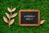 Top View Blackboard Mock-Up And Paper Leaves Psd