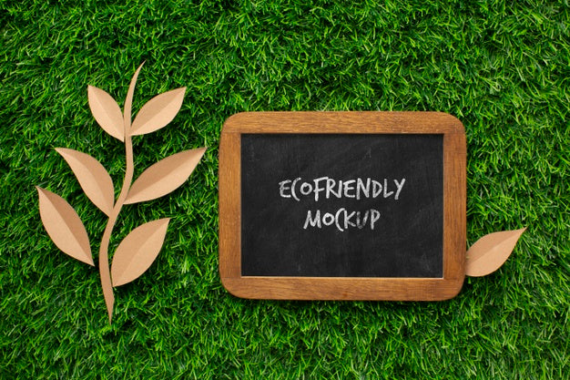 Top View Blackboard Mock-Up And Paper Leaves Psd