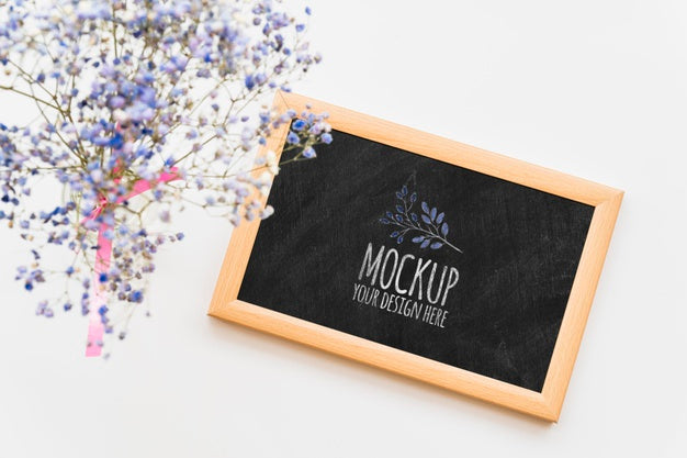 Top View Blue Flowers On Blackboard Psd