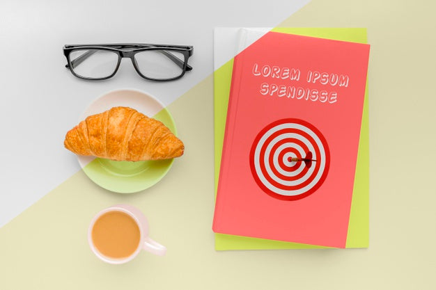 Top View Book Cover Mock-Up Composition With Cup Of Coffee And Croissant Psd