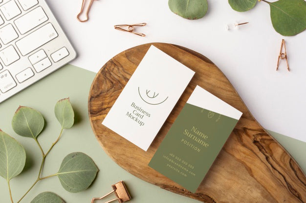 Top View Business Cards On Wood And Keybaord Psd