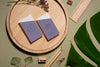Top View Business Cards On Wood Piece Psd
