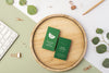Top View Business Cards On Wood With Leaves Psd