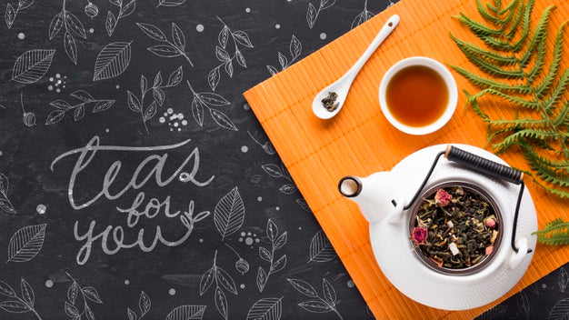 Top View Ceramic Tea Pot With Herbs Psd