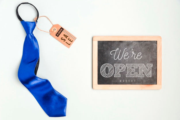 Top View Chalkboard Frame And Tie With Tag Psd