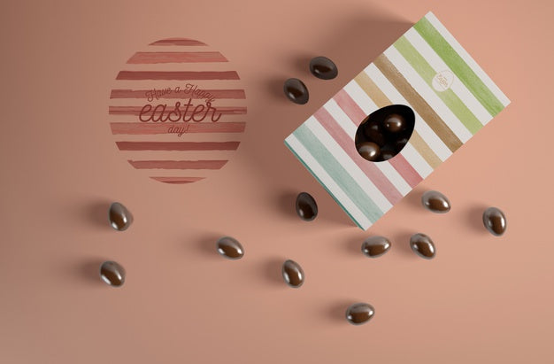 Top View Chocolate Egg In Box With Candies Beside Psd