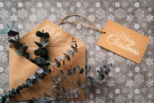 Top View Christmas Envelope With Tag Psd