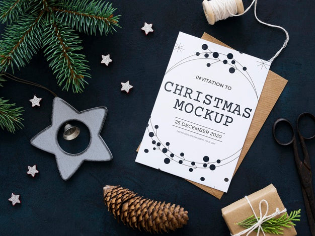 Top View Christmas Eve Composition With Card And Envelope Psd