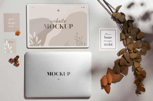 Top View Closed Laptop With Mockup With Leaves Psd