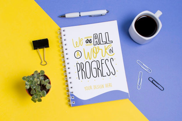 Top View Coffee Cup And Notepad With Mock-Up Psd