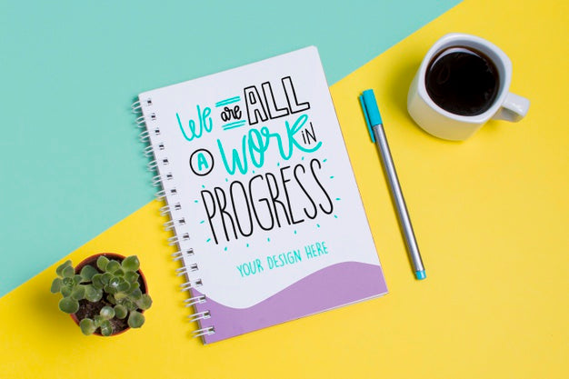 Top View Coffee Cup And Notepad With Mock-Up Psd