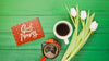 Top View Collection Of Coffee Cup Next To Flowers Psd