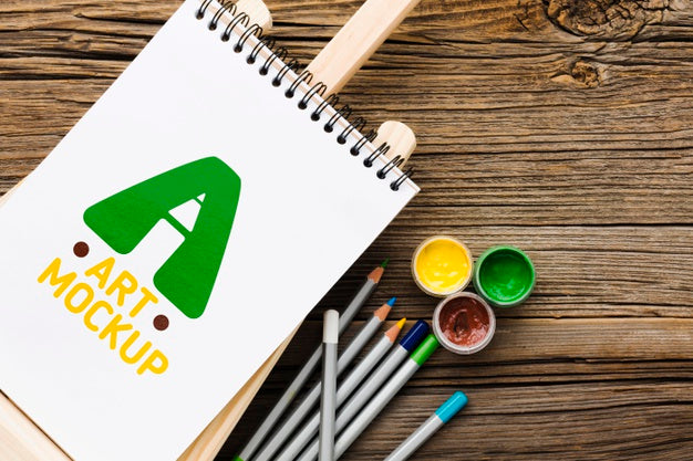 Top View Colorful Paint On Wooden Background Psd