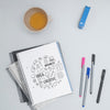 Top View Colorful Pens With Lettering Psd