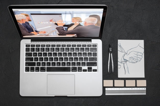 Top View Composition With Laptop And Office Supplies Psd