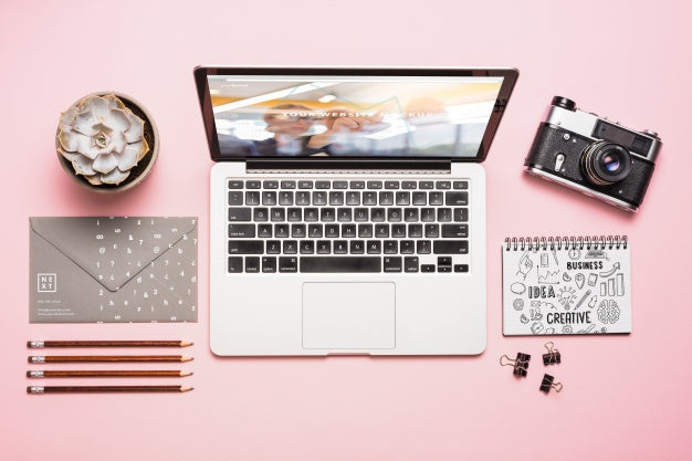 Top View Composition With Laptop And Office Supplies Psd
