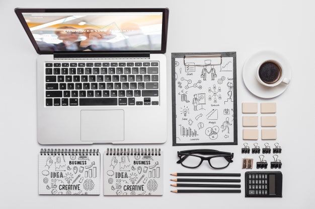 Top View Composition With Laptop And Office Supplies Psd